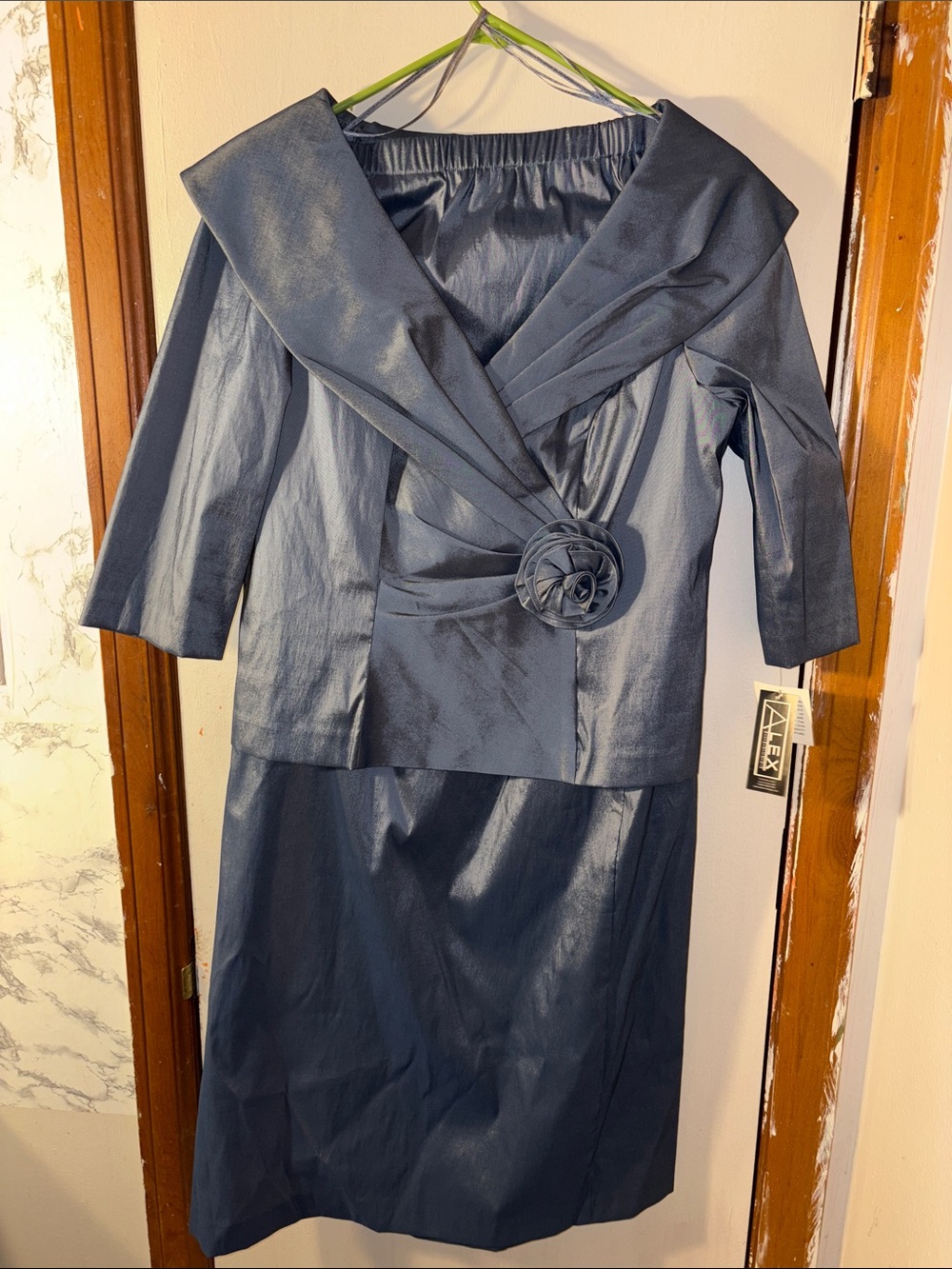 Alex Evenings Silky Navy Two-Piece Skirt Suit with Decorative Rosette